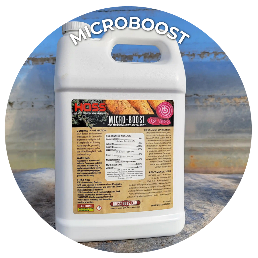 Quart container of microboost fertilizer sitting on a grey table. 